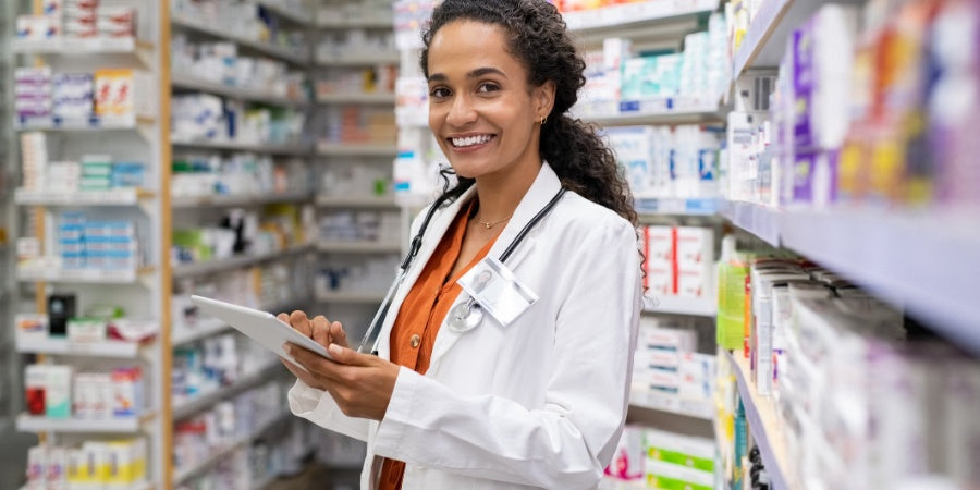 Pharmacist holding ENTEROSGEL in a pharmacy 