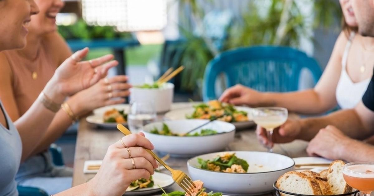 People enjoying healthy food together outdoors - managing gut health and digestive side effects of weight loss injections with Enterosgel UK
